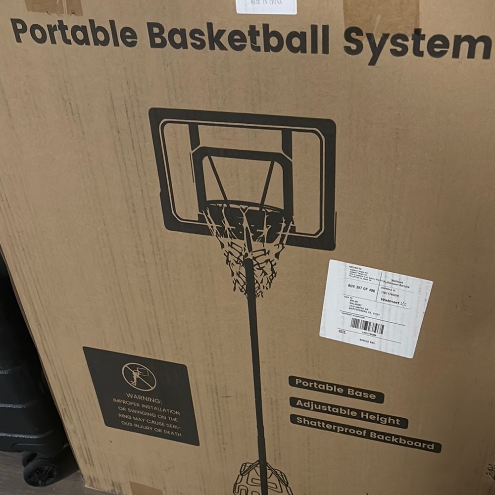 Portable Basketball System with Adjustable Height